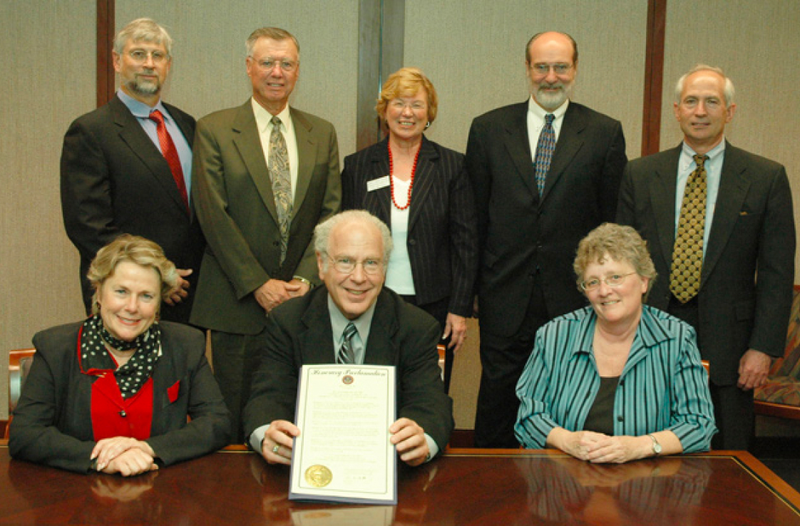 Some founding members with staff holding Governor Ritter's proclamation